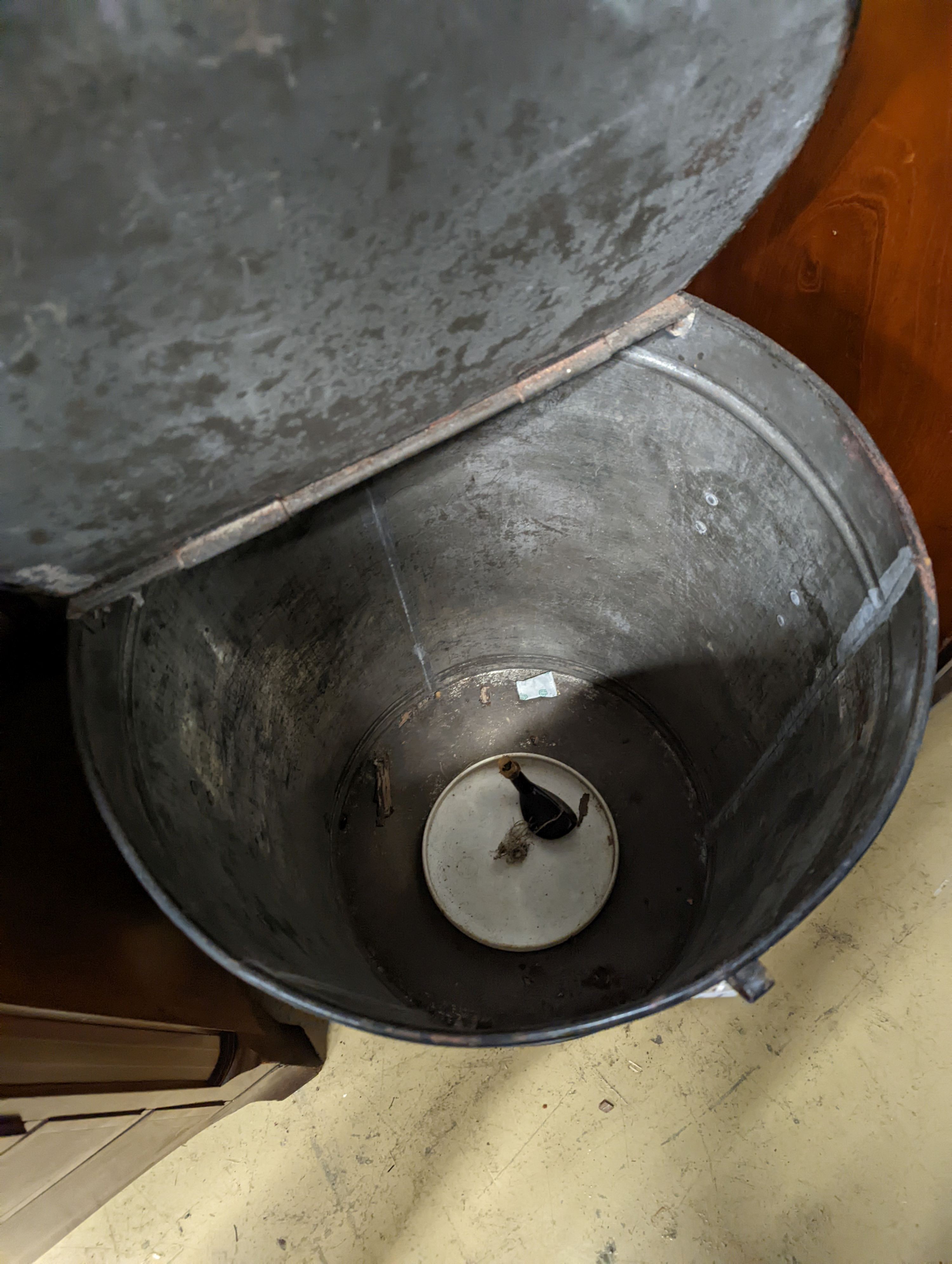 A painted tin bin decorated with a pig, diameter 47cm, height 70cm